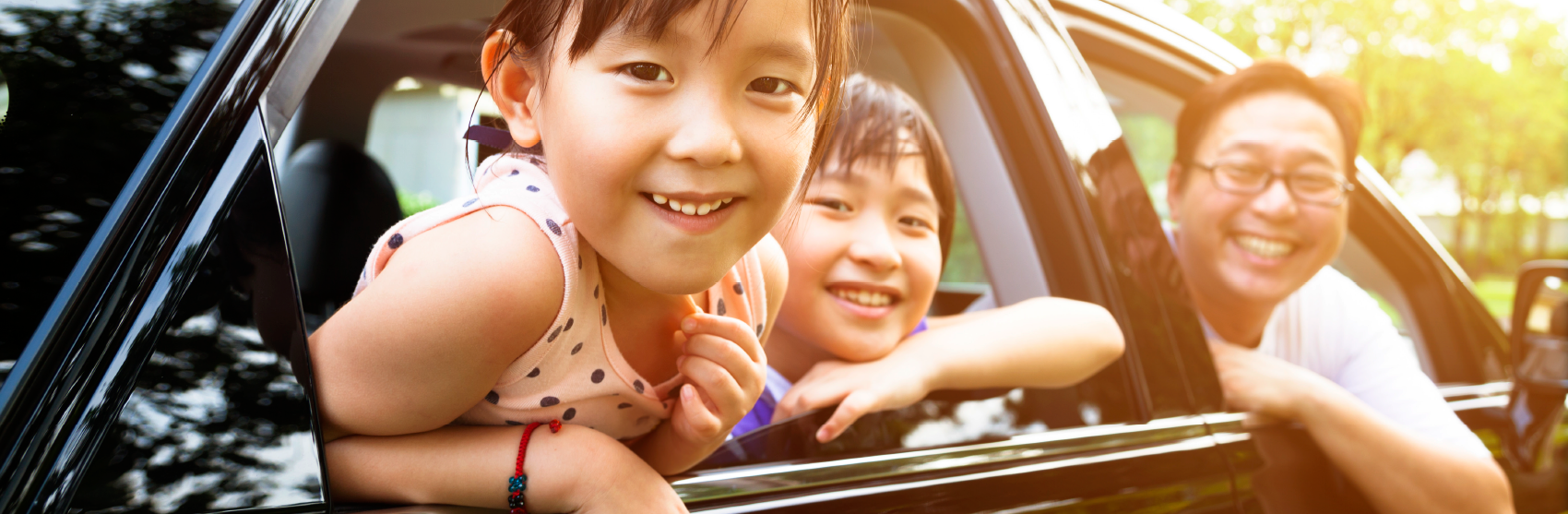 Kids in car with father