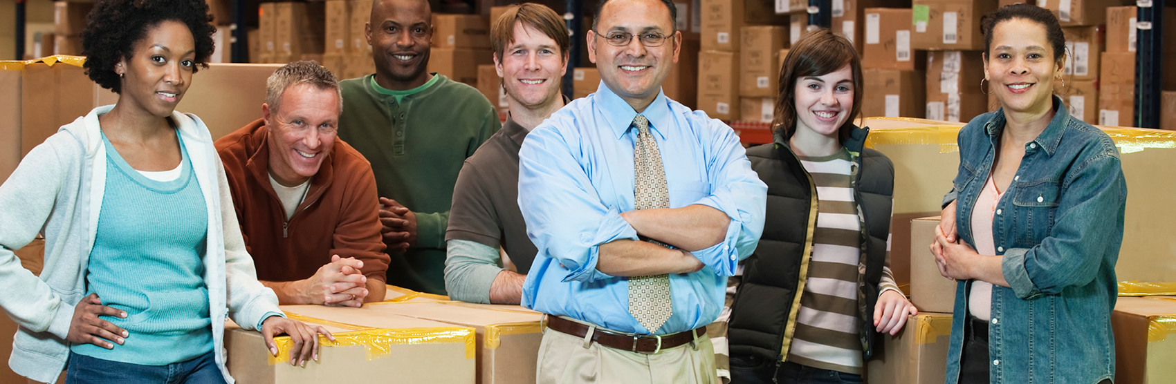 Diverse group of employees standing together