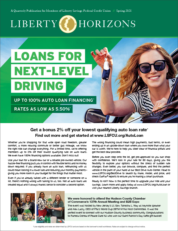 Happy woman in new car holding key that just got a great deal on a Liberty Savings Auto Loan